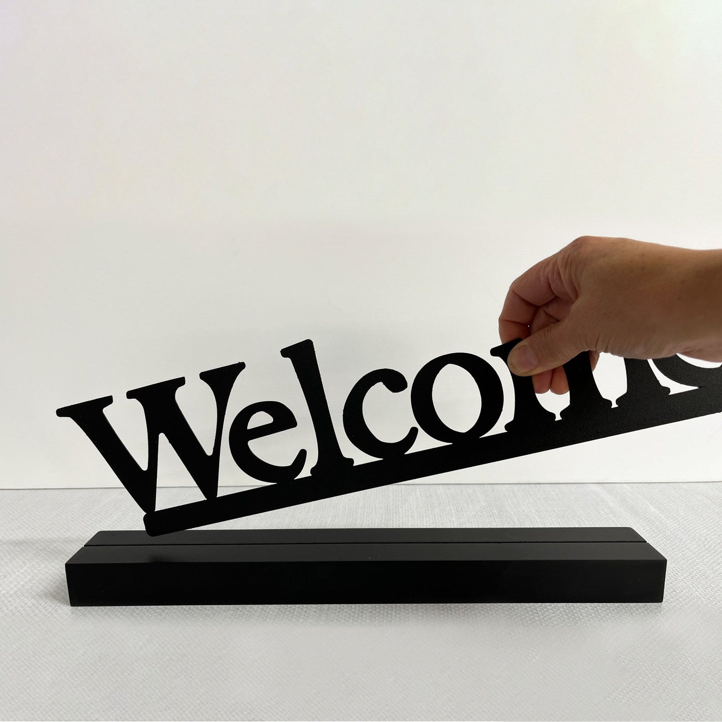 Magnetic lettering "Welcome" to decorate, with wooden base
