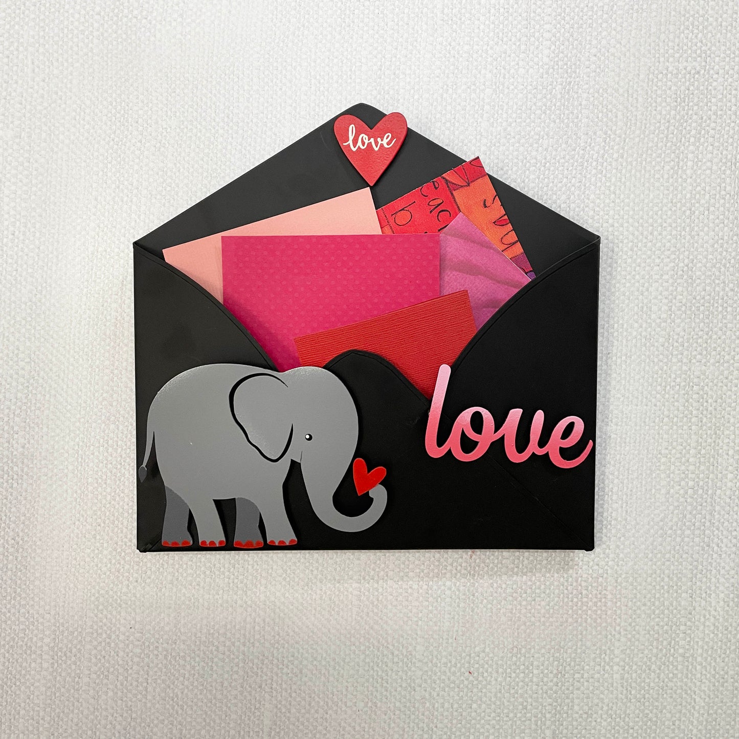 Elephant with heart magnet